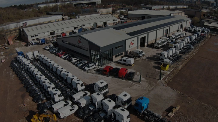 Aerial image of SMUK building and yard showing many HGV and Van vehicles
