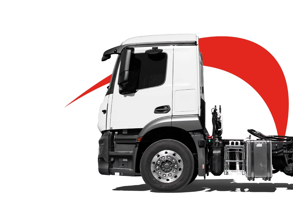 profile view of a white HGV with safety cameras fitted