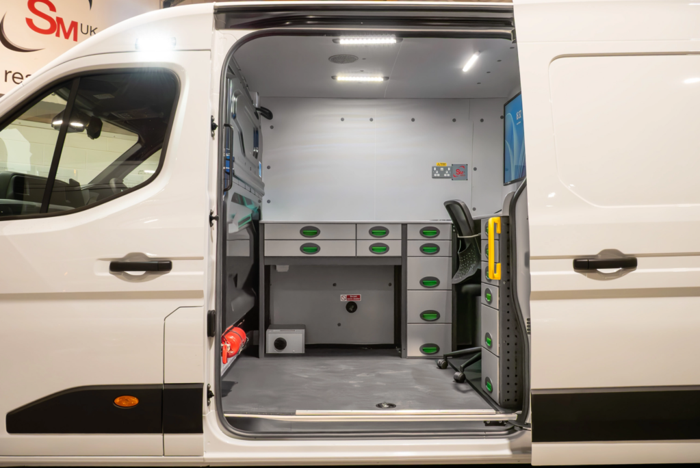 Drainage blueprint conversion by SM UK showing view into side door with desk and mobile office