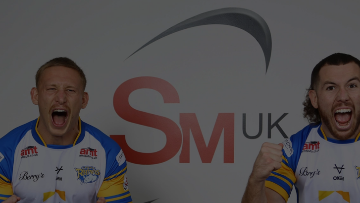 Leeds Rhino's players celebrating by SM UK logo