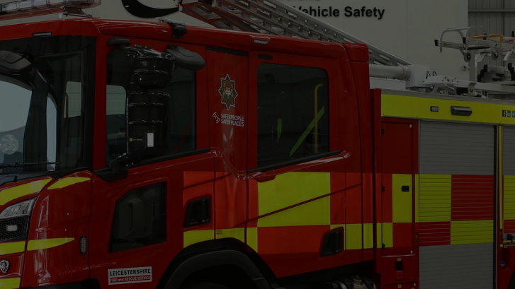 Fire Engine fitted with Truck Door Window outside SM UK headquarters